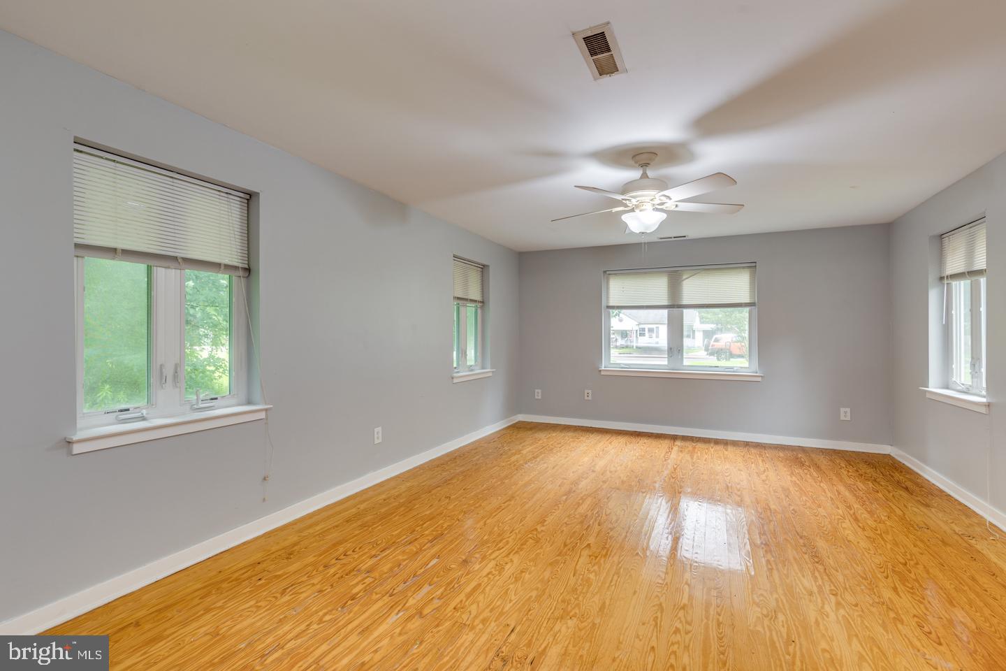 485 Main Street Lumberton, NJ 08048 - Photo 9 of 40 wooden floor in an empty room with a window