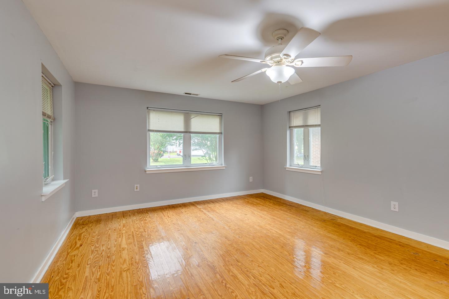 485 Main Street Lumberton, NJ 08048 - Photo 10 of 40 a view of a big room with windows and chandelier fan