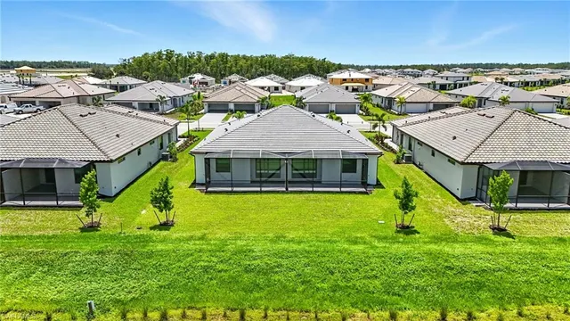 an aerial view of a house with a garden