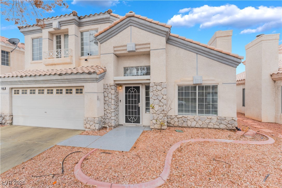 3695 Funston Way Las Vegas, NV 89129 - Photo 1 of 43 Mediterranean / spanish home with a chimney, a tile roof, stucco siding, and concrete driveway