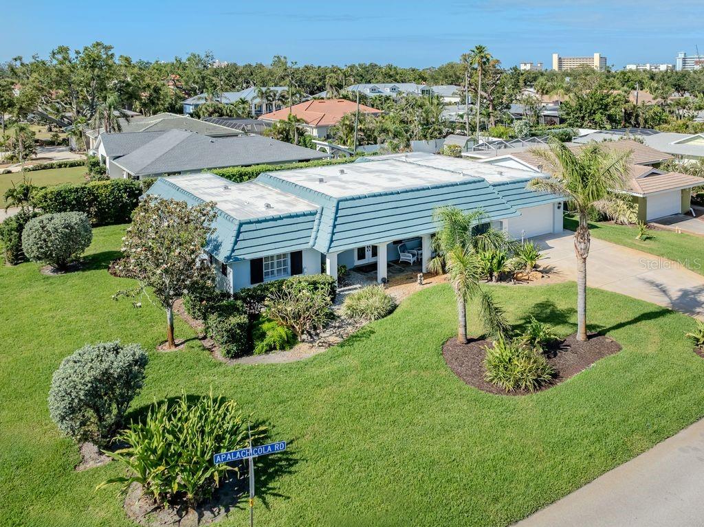601 Apalachicola Road Venice, FL 34285 - Photo 27 of 33 a front view of a house with a garden