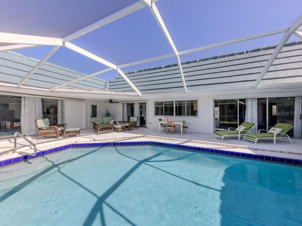 601 Apalachicola Road Venice, FL 34285 - Photo 3 of 33 a view of a house with sitting area and furniture