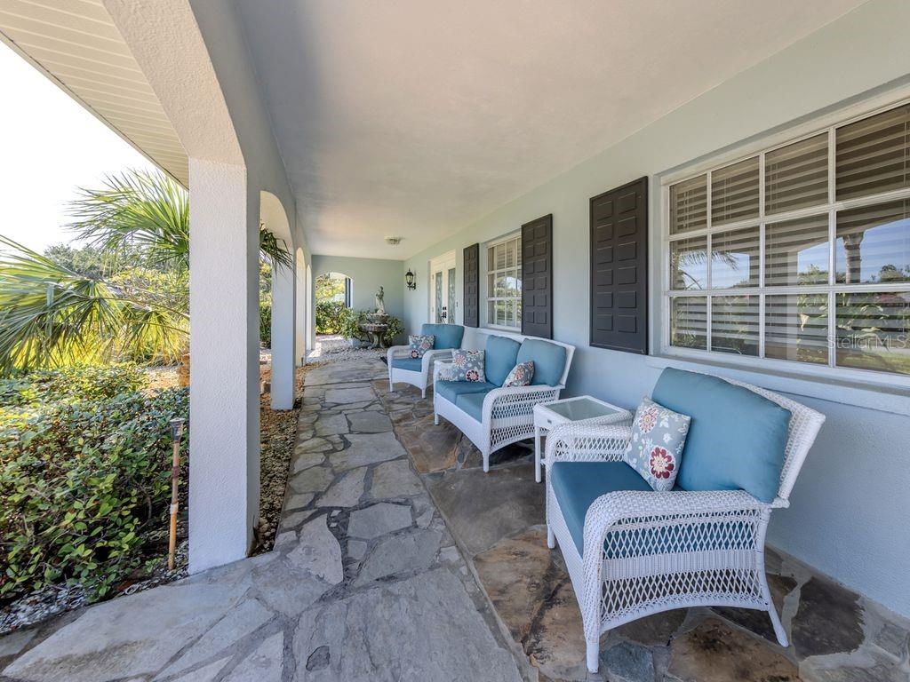 601 Apalachicola Road Venice, FL 34285 - Photo 32 of 33 a balcony with furniture and outdoor view
