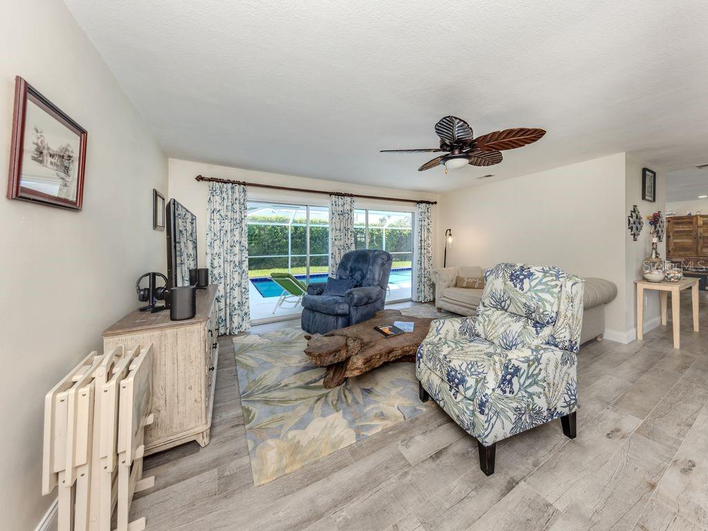 601 Apalachicola Road Venice, FL 34285 - Photo 8 of 33 a living room with furniture and a window