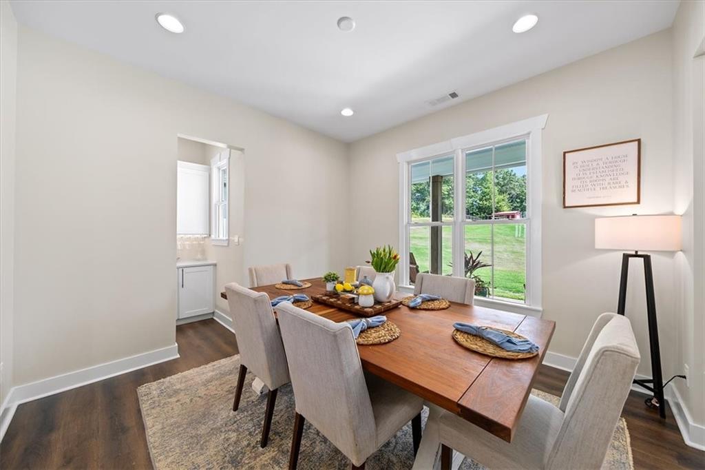 1380 Cronic Town Road Auburn, GA 30011 - Photo 11 of 69 a dining room with furniture and window