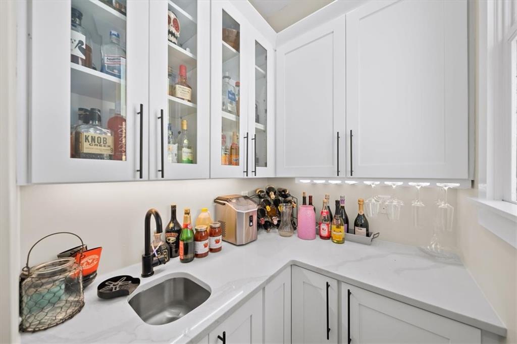 1380 Cronic Town Road Auburn, GA 30011 - Photo 12 of 69 a bathroom with a sink and a mirror