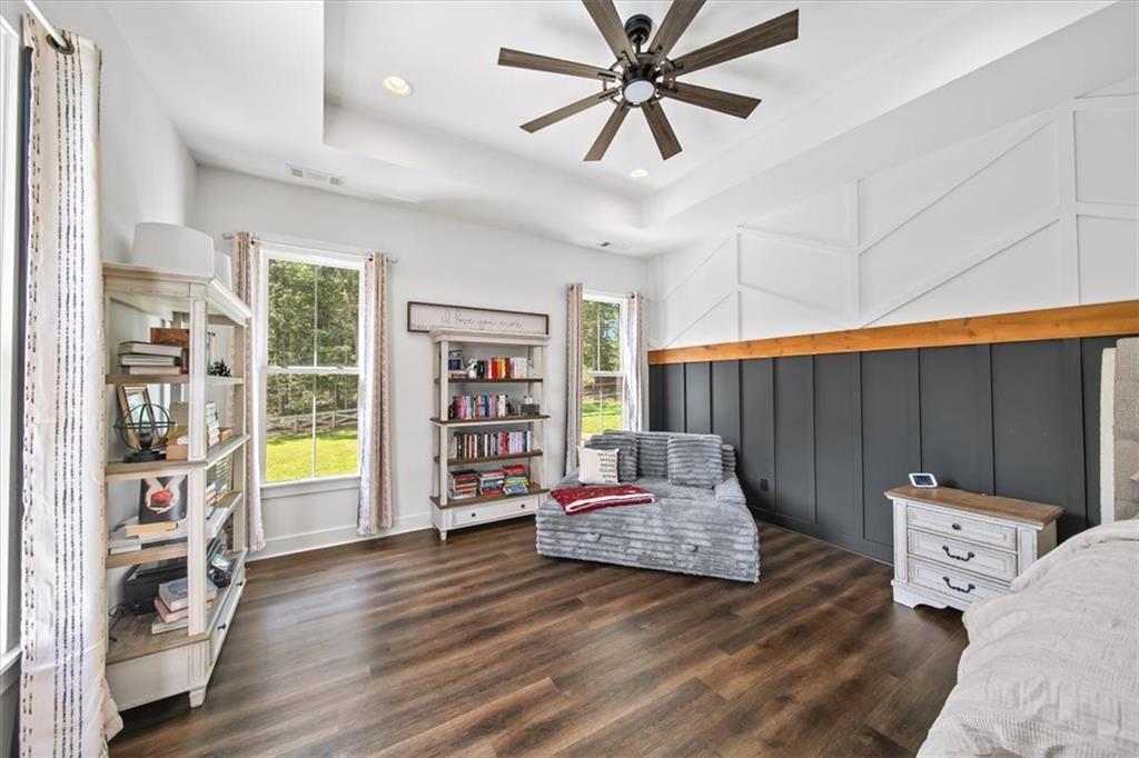 1380 Cronic Town Road Auburn, GA 30011 - Photo 15 of 69 a living room with furniture and a book shelf