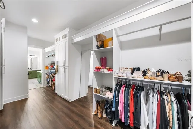 a bathroom with a sink vanity mirror and vanity