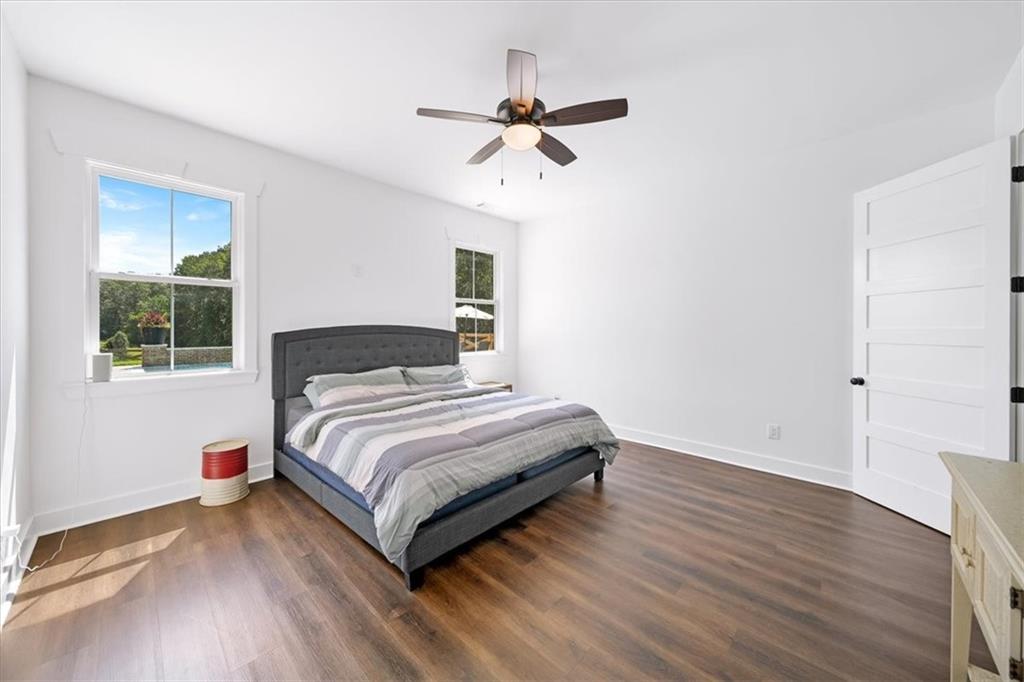 1380 Cronic Town Road Auburn, GA 30011 - Photo 48 of 69 a bedroom with a bed and window