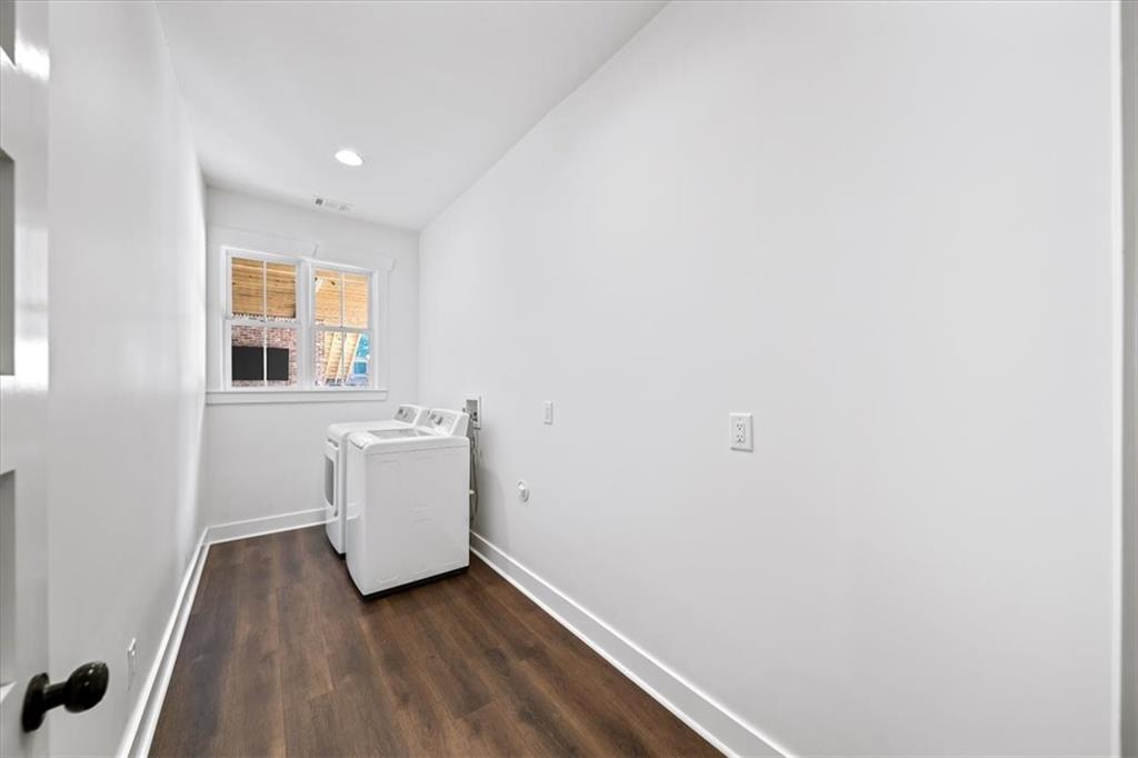 1380 Cronic Town Road Auburn, GA 30011 - Photo 50 of 69 a view of a room with wooden floor and sink