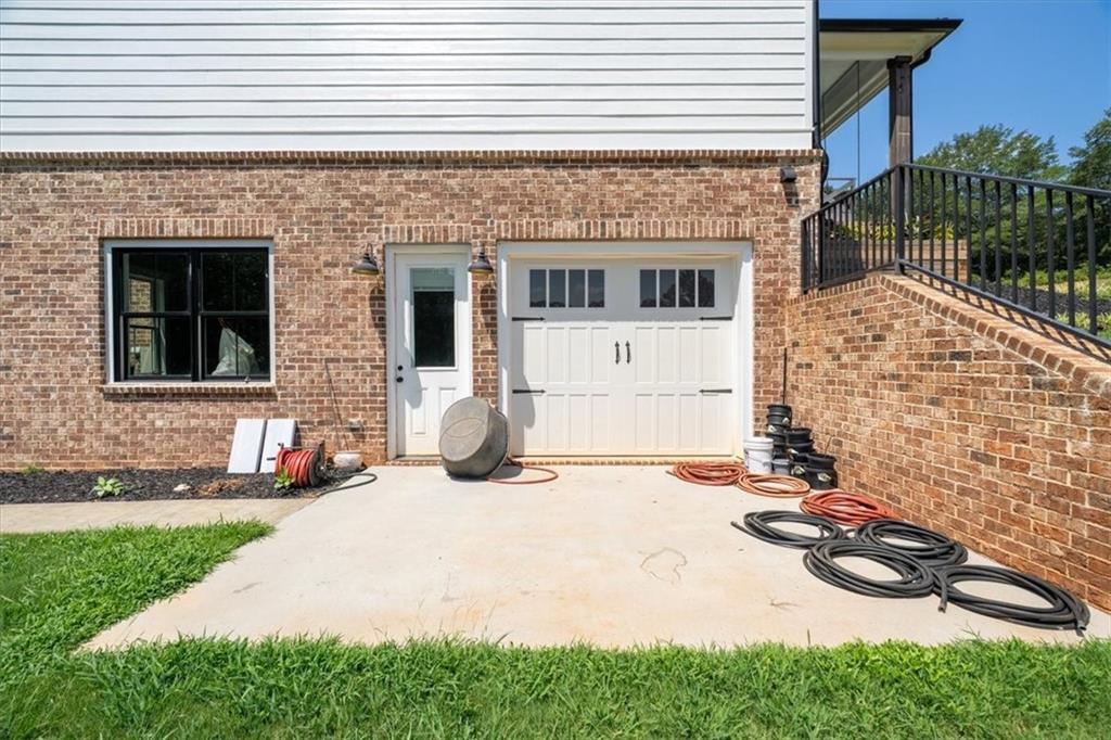 1380 Cronic Town Road Auburn, GA 30011 - Photo 59 of 69 a front view of a house with a yard