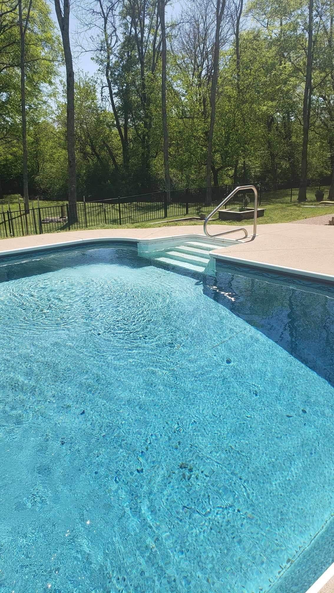 1457 Bern Drive Spring Hill, TN 37174 - Photo 13 of 28 a view of a swimming pool with an outdoor space and seating area