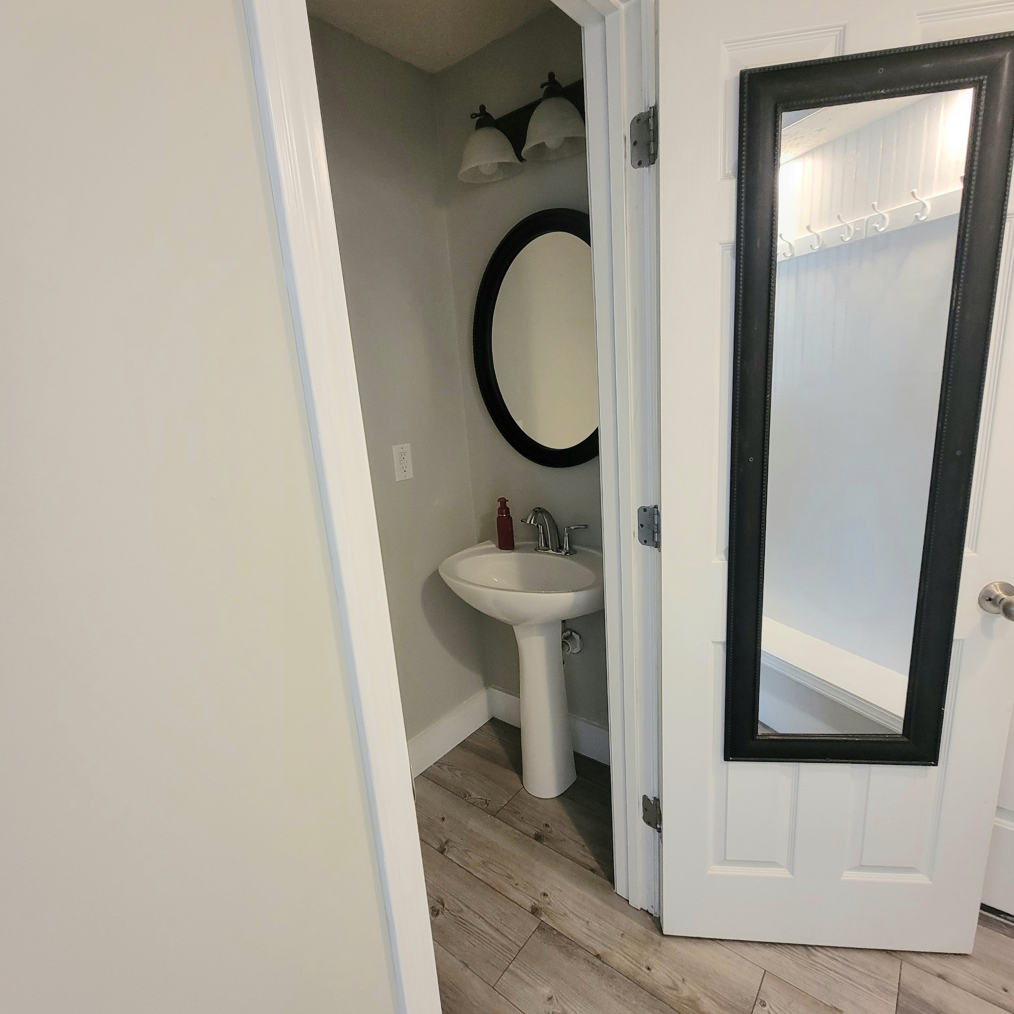1457 Bern Drive Spring Hill, TN 37174 - Photo 28 of 28 a bathroom with a sink and a mirror