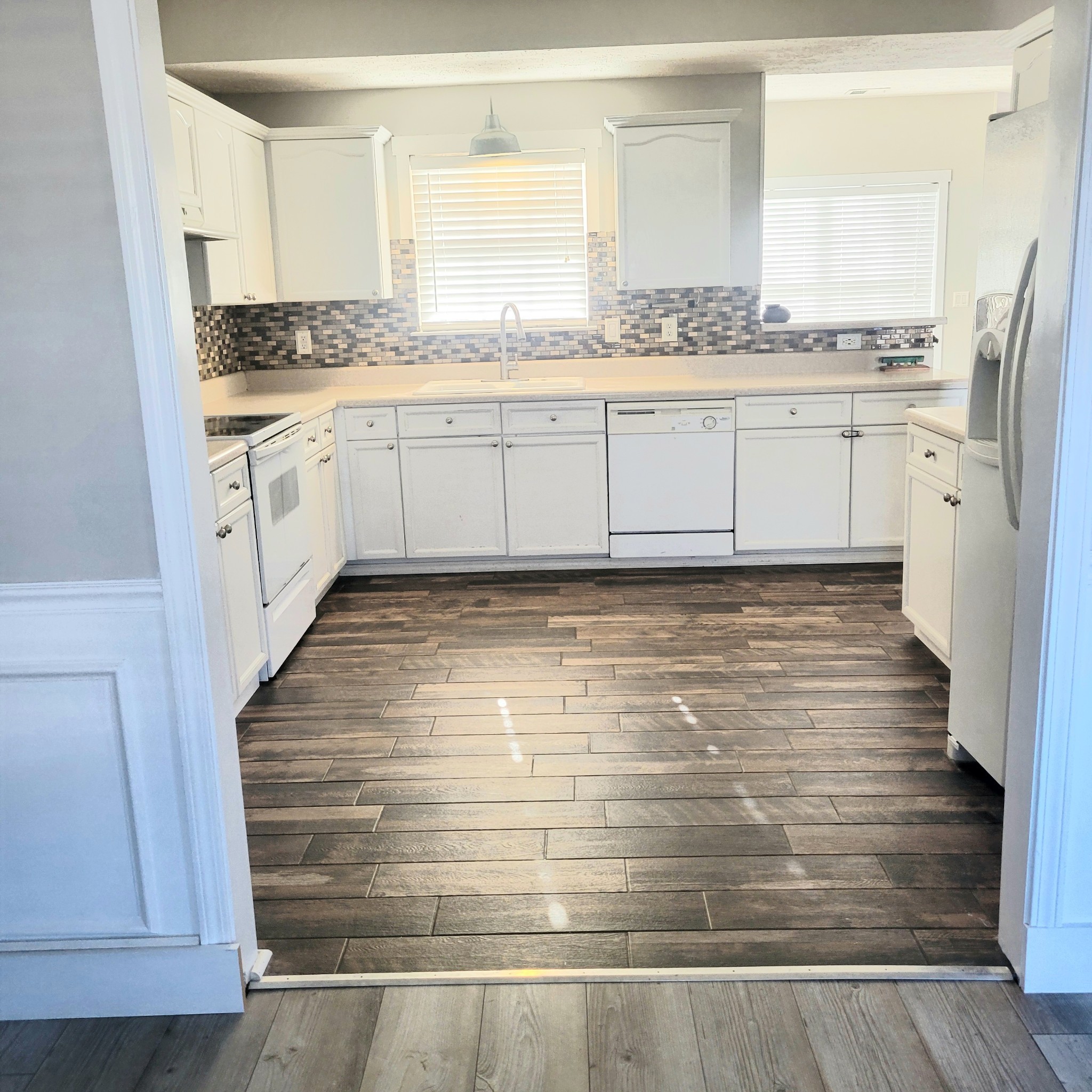 1457 Bern Drive Spring Hill, TN 37174 - Photo 4 of 28 a bathroom with granite countertop a sink and a stove