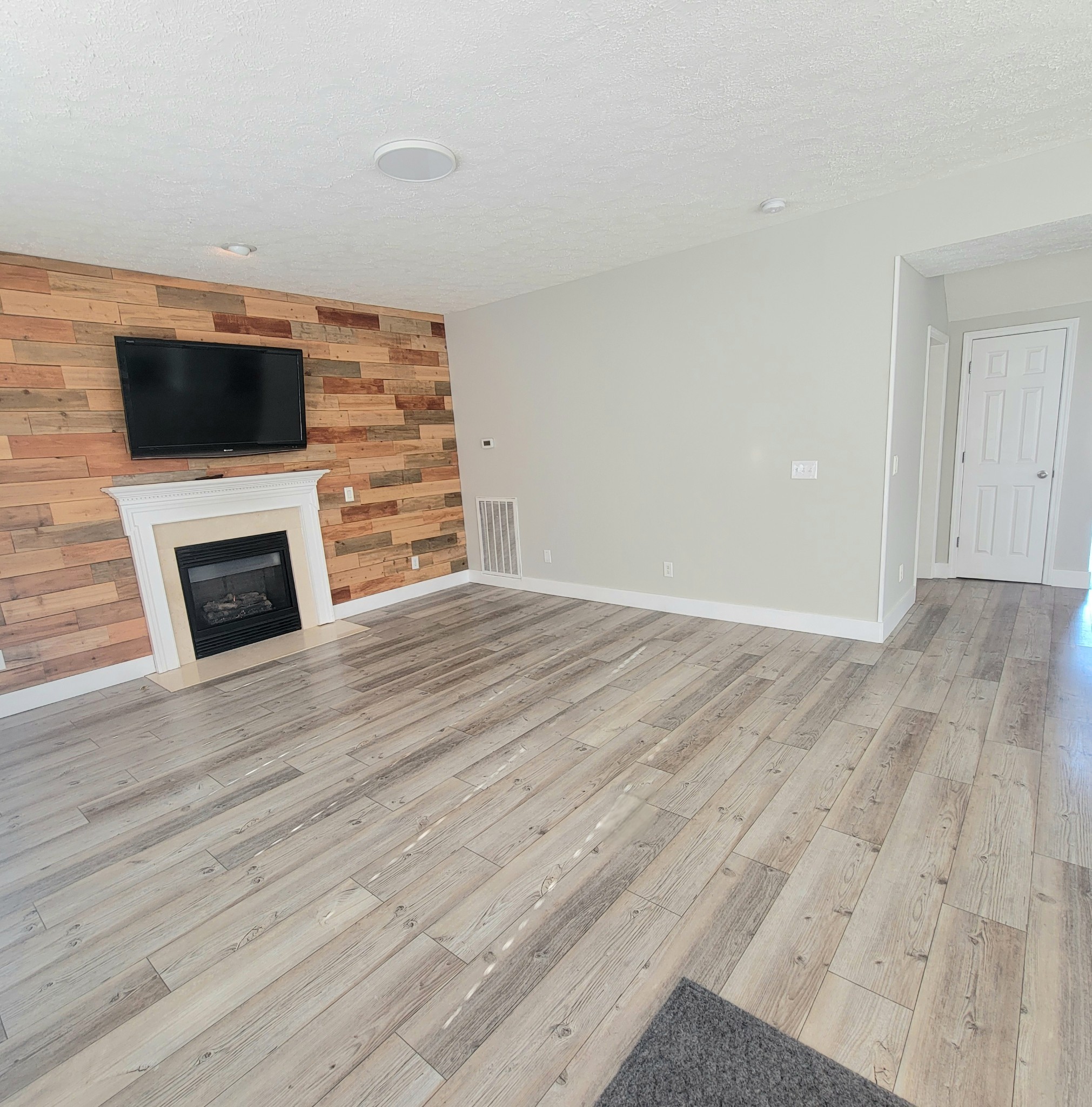 1457 Bern Drive Spring Hill, TN 37174 - Photo 5 of 28 a view of a livingroom with a flat screen tv