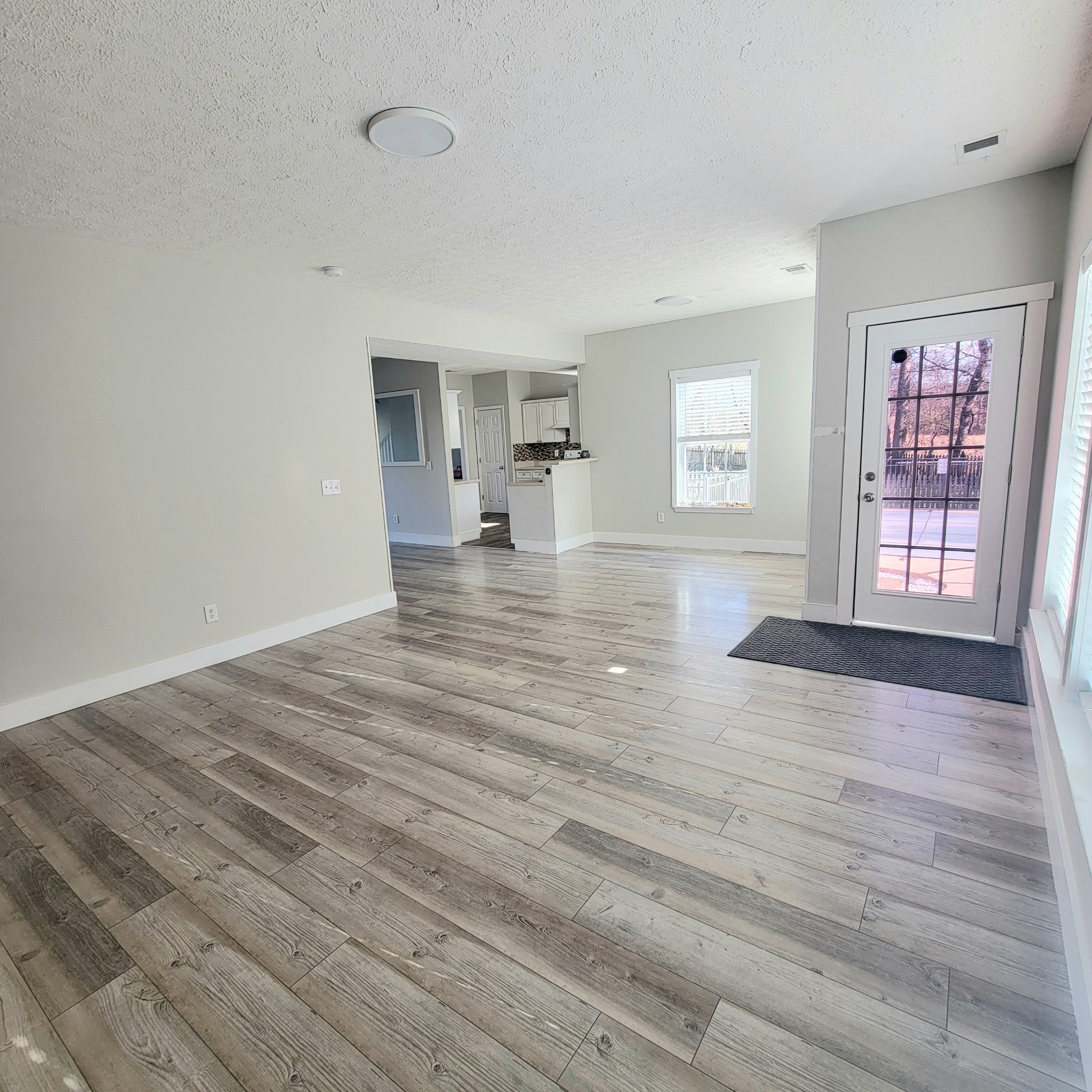 1457 Bern Drive Spring Hill, TN 37174 - Photo 6 of 28 wooden floor in an empty room with a window