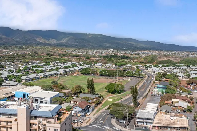 a view of a city with a lake