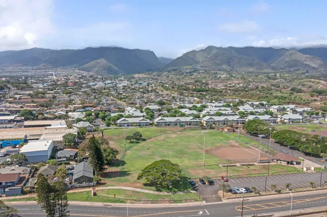 a view of a city with ocean view