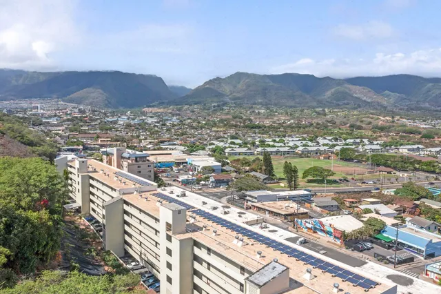 an aerial view of residential house and outdoor space
