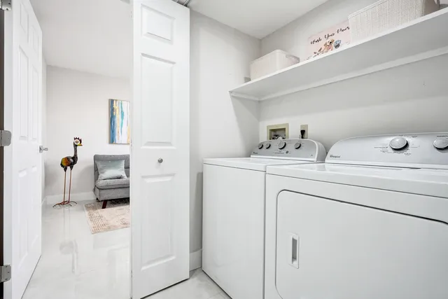 a picture of a living room with a wooden floor