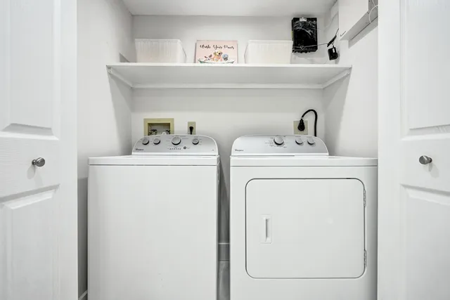 a black and white photo of a living room