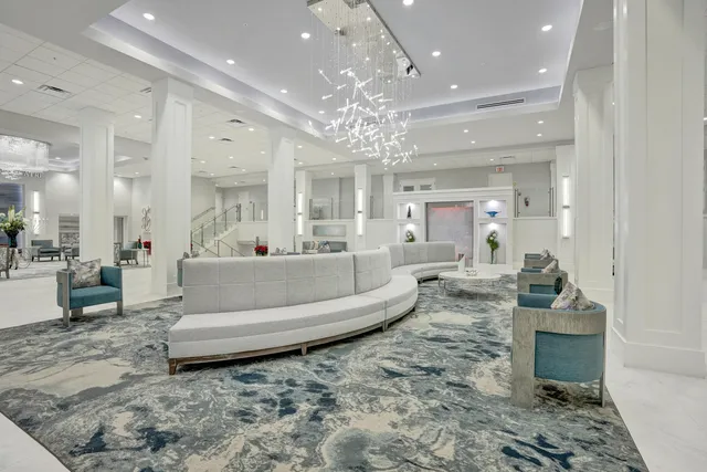 an aerial view of a city with lake view