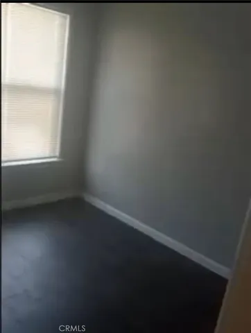 a bathroom that has a window in it