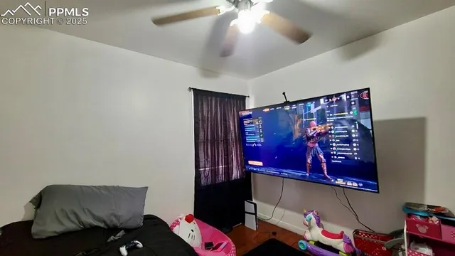 a view of a room with toys and a projector