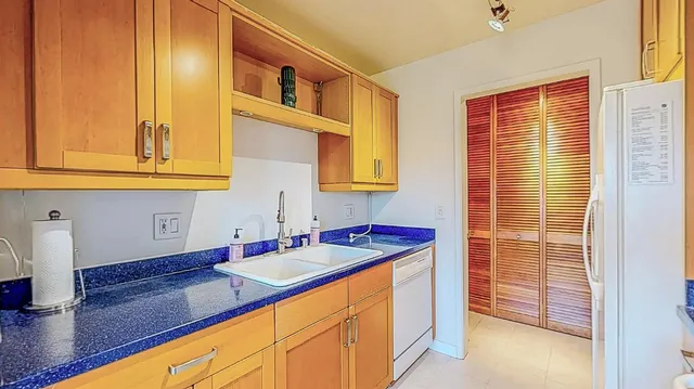 a kitchen with a stove and a microwave