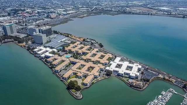 a view of outdoor space with deck and lake view