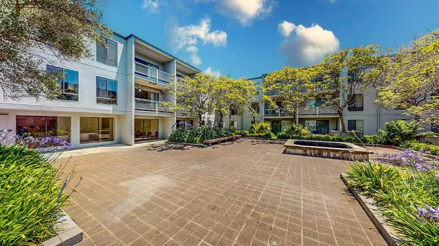 front view of a house with a small yard