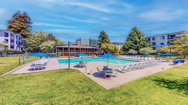 a room with a table and chairs
