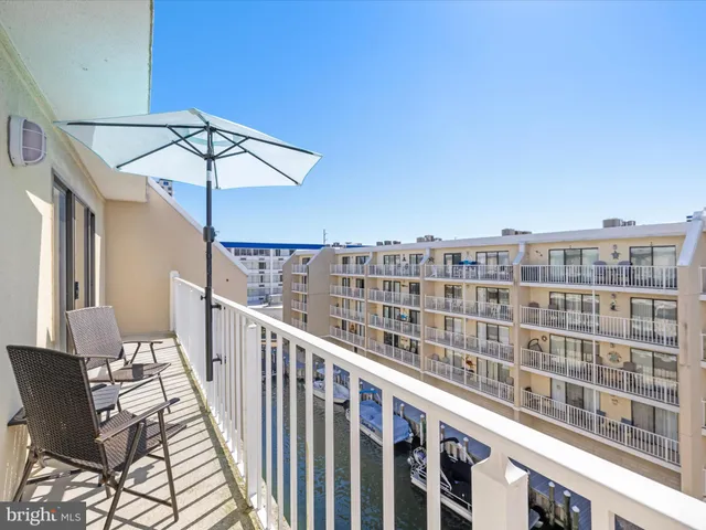a view of balcony with furniture