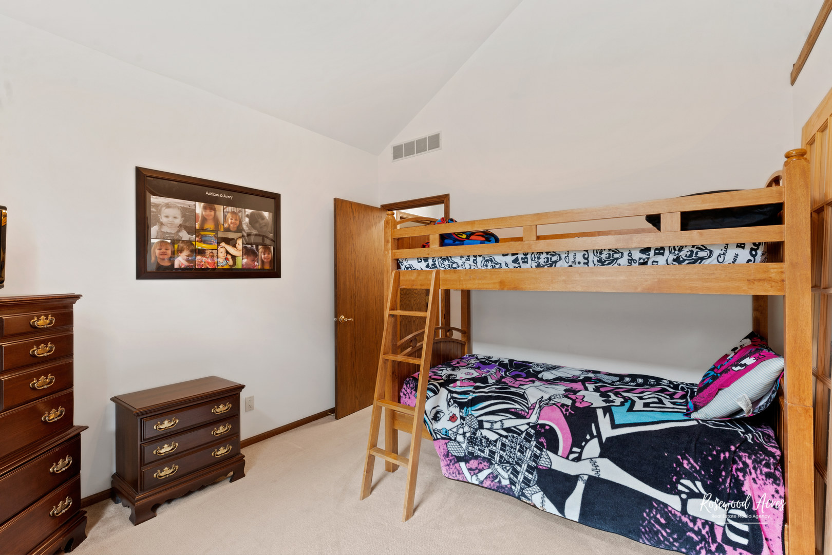 1900 Bittersweet Drive St. Anne, IL 60964 - Photo 15 of 23 a bed room with a bed and a baby crib