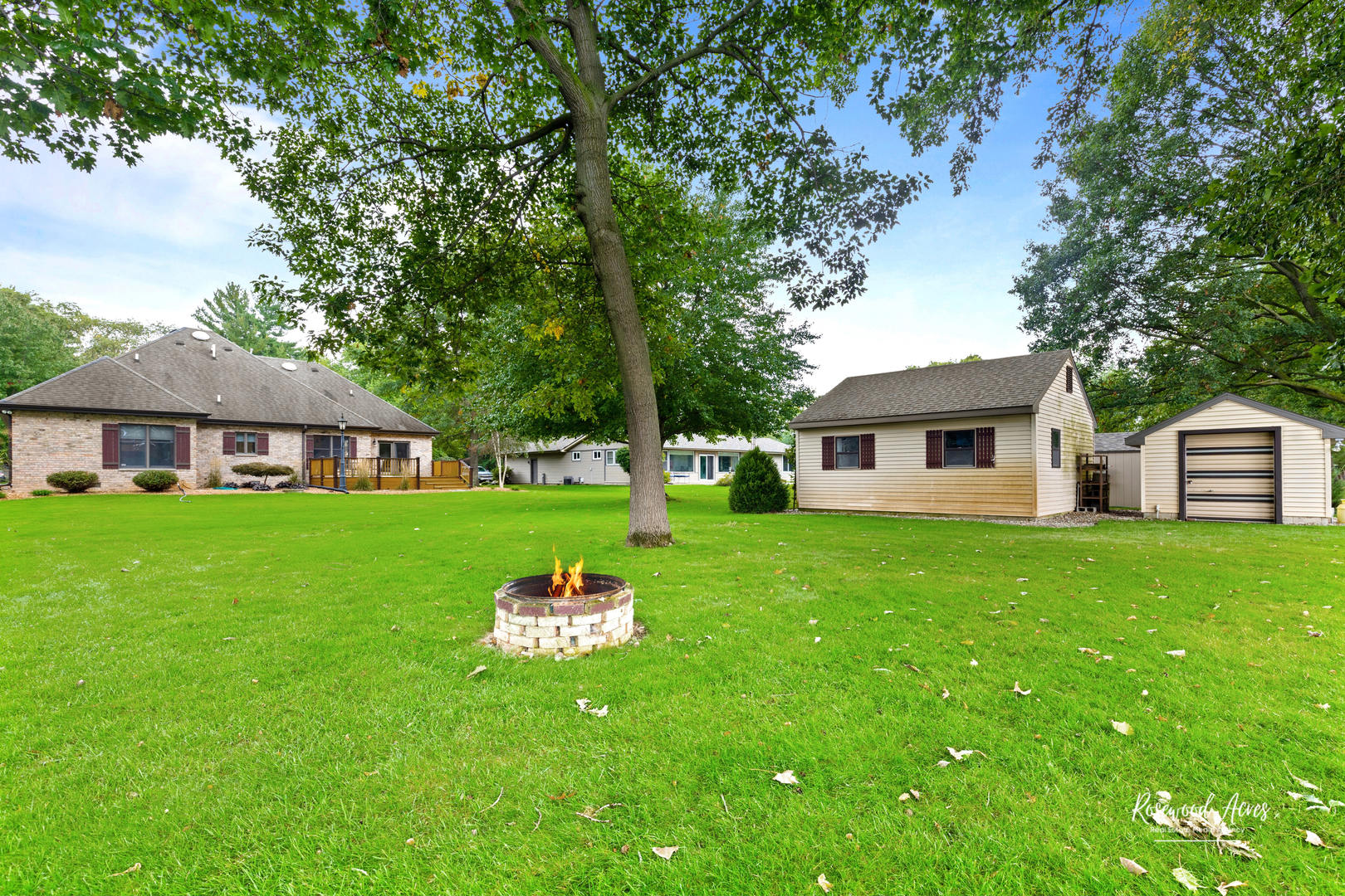 1900 Bittersweet Drive St. Anne, IL 60964 - Photo 21 of 23 a front view of a house with a yard table and chairs