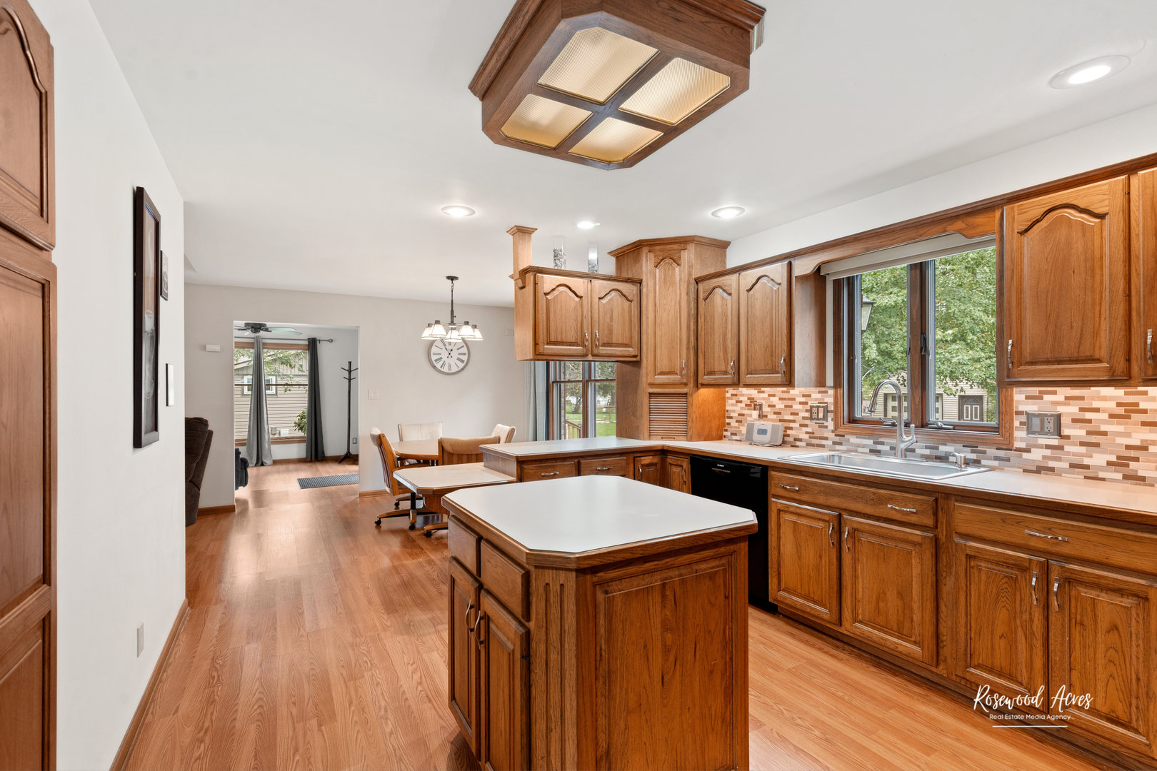 1900 Bittersweet Drive St. Anne, IL 60964 - Photo 6 of 23 a kitchen with a sink stove and cabinets