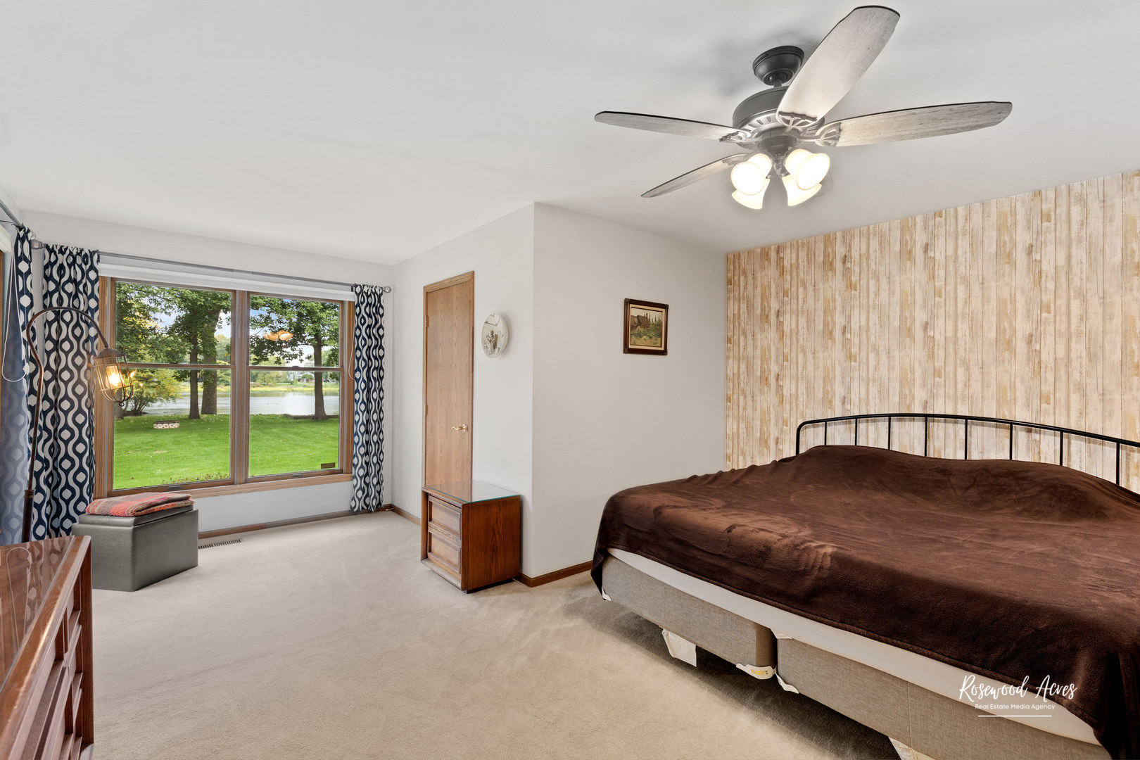 1900 Bittersweet Drive St. Anne, IL 60964 - Photo 9 of 23 a living room with a bed furniture and a large window