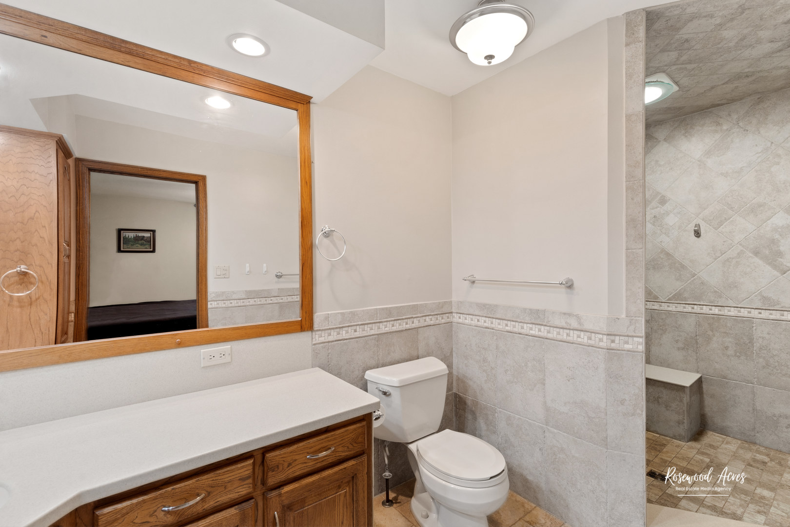 1900 Bittersweet Drive St. Anne, IL 60964 - Photo 10 of 23 a bathroom with a sink a toilet and shower