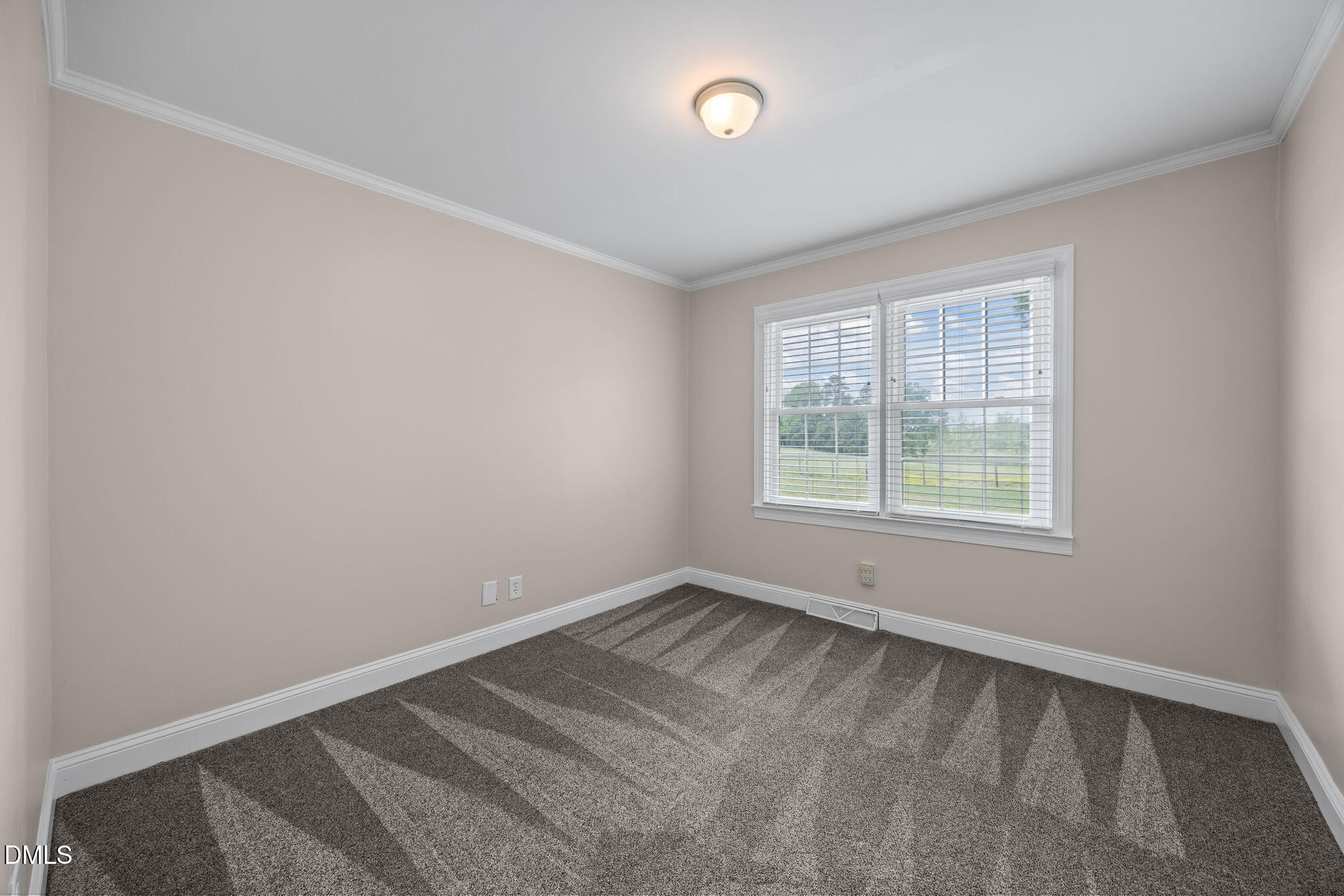 3611 Chewning Road Oxford, NC 27565 - Photo 41 of 45 an empty room with a window