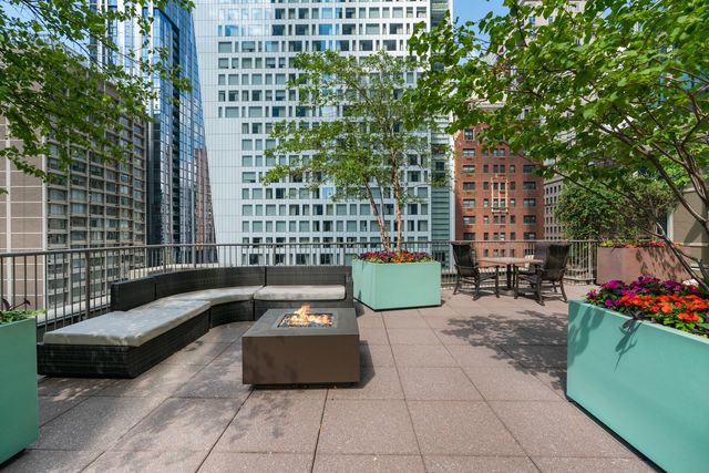 a building outdoor space with patio furniture