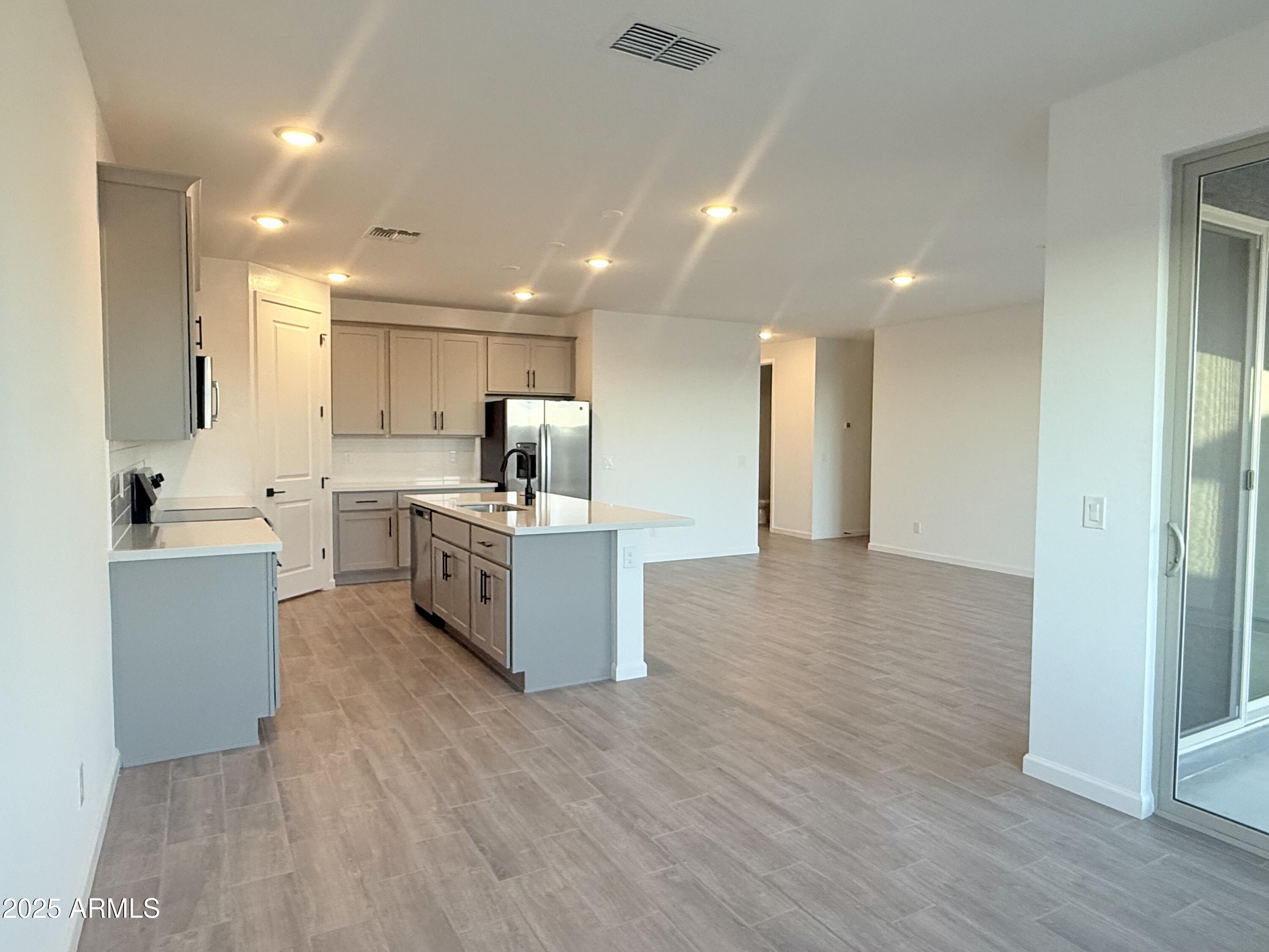 2487 Rolling Pr Lane San Tan Valley, AZ 85140 - Photo 12 of 45 012 Kitchen and Great Room