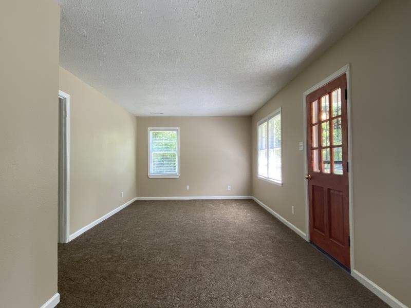 4711 Dalton Road Memphis, TN 38109 - Photo 3 of 8 an empty room with windows
