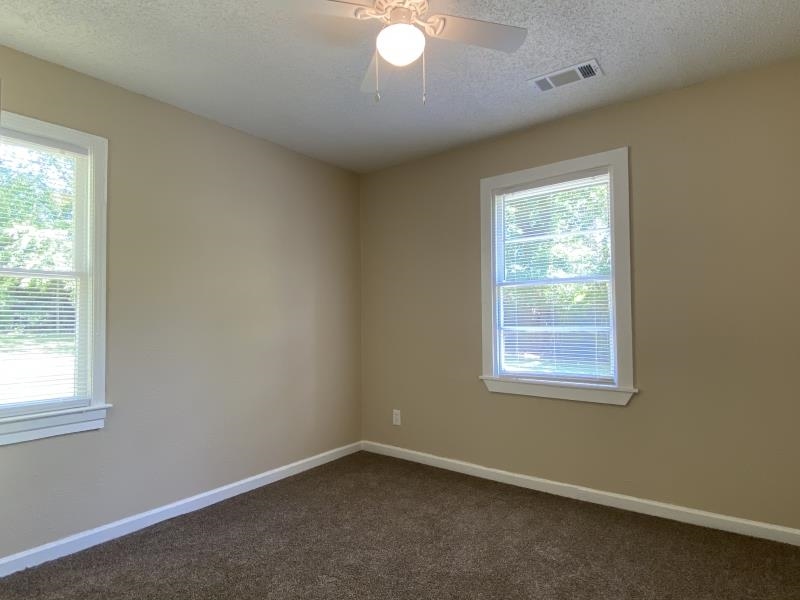 4711 Dalton Road Memphis, TN 38109 - Photo 5 of 8 an empty room with a window