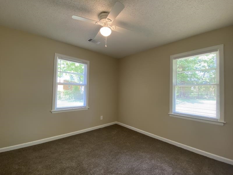 4711 Dalton Road Memphis, TN 38109 - Photo 7 of 8 an empty room with a window
