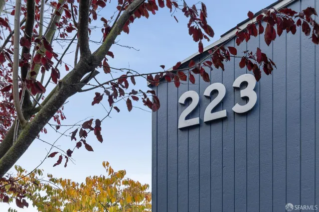 a view of parking garage with cars