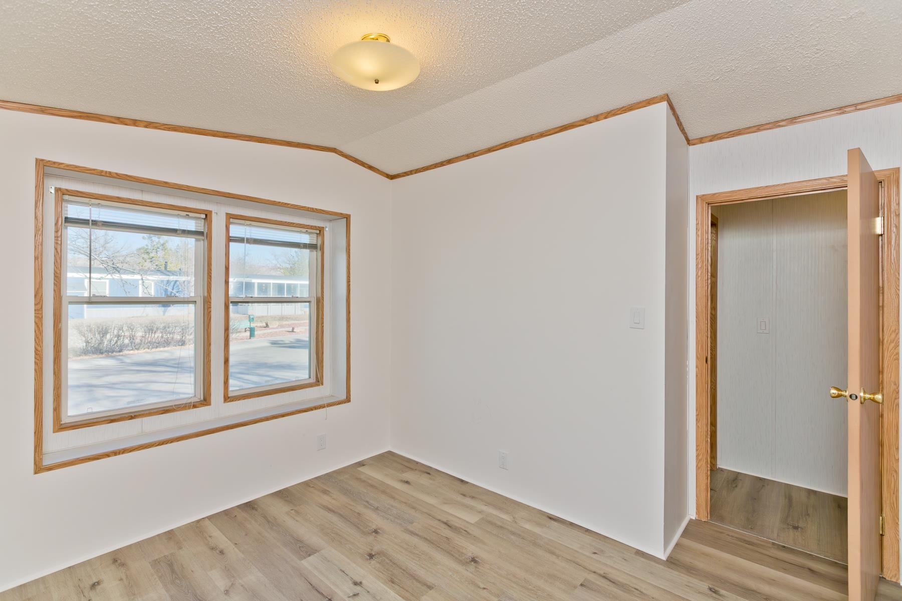 435 32 Road, Unit 521 Clifton, CO 81520 - Photo 14 of 26 an empty room with windows and closet