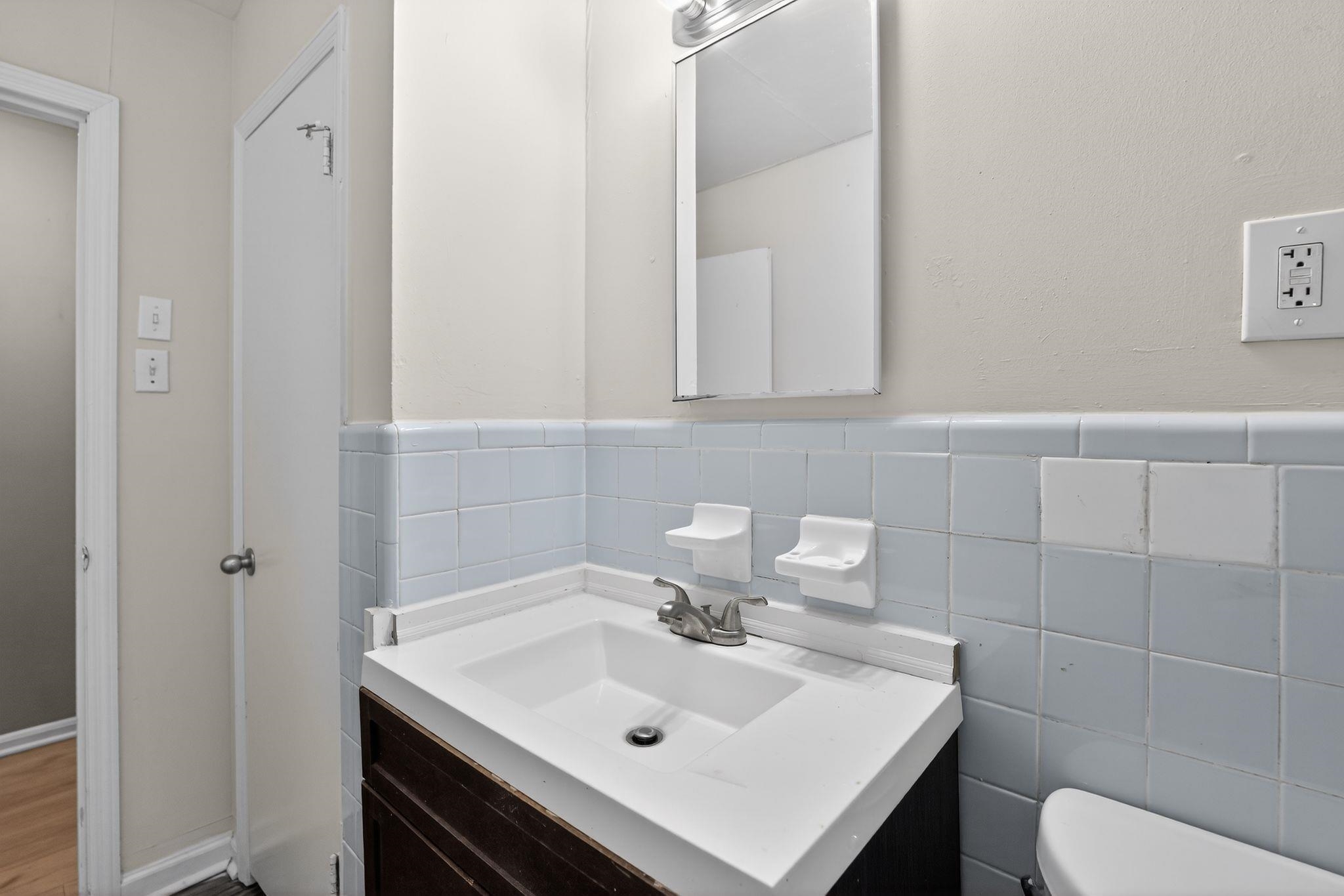 134 West Holmes Road Memphis, TN 38109 - Photo 29 of 30 Half bath with vanity and toilet