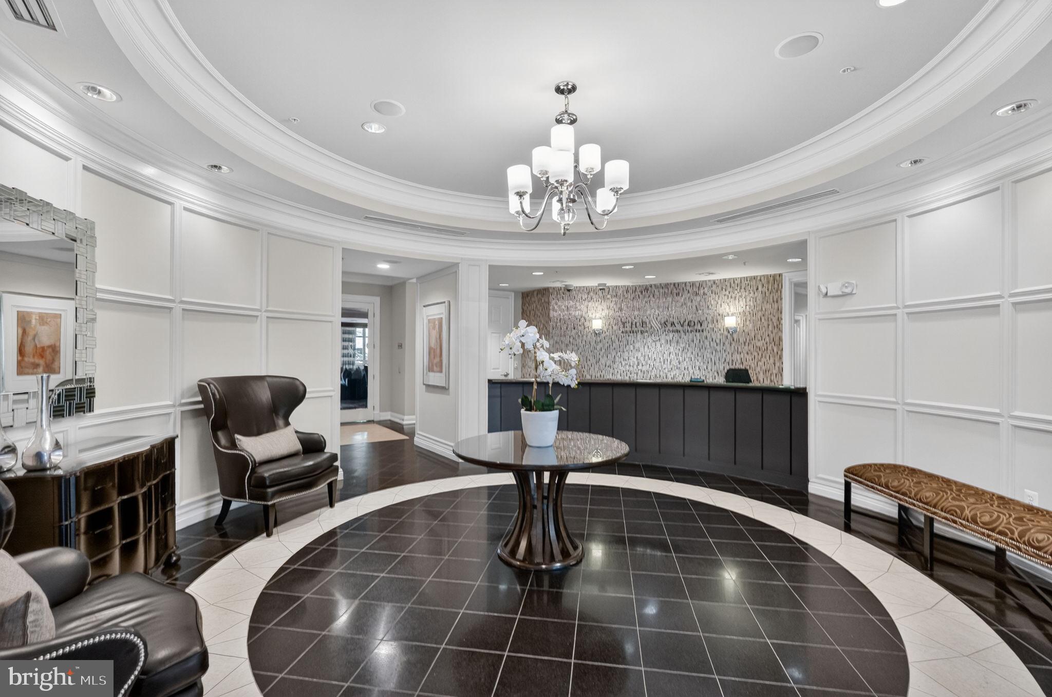 12000 Market Street, Unit 266 Reston, VA 20190 - Photo 24 of 49 Front desk with on-site Manager