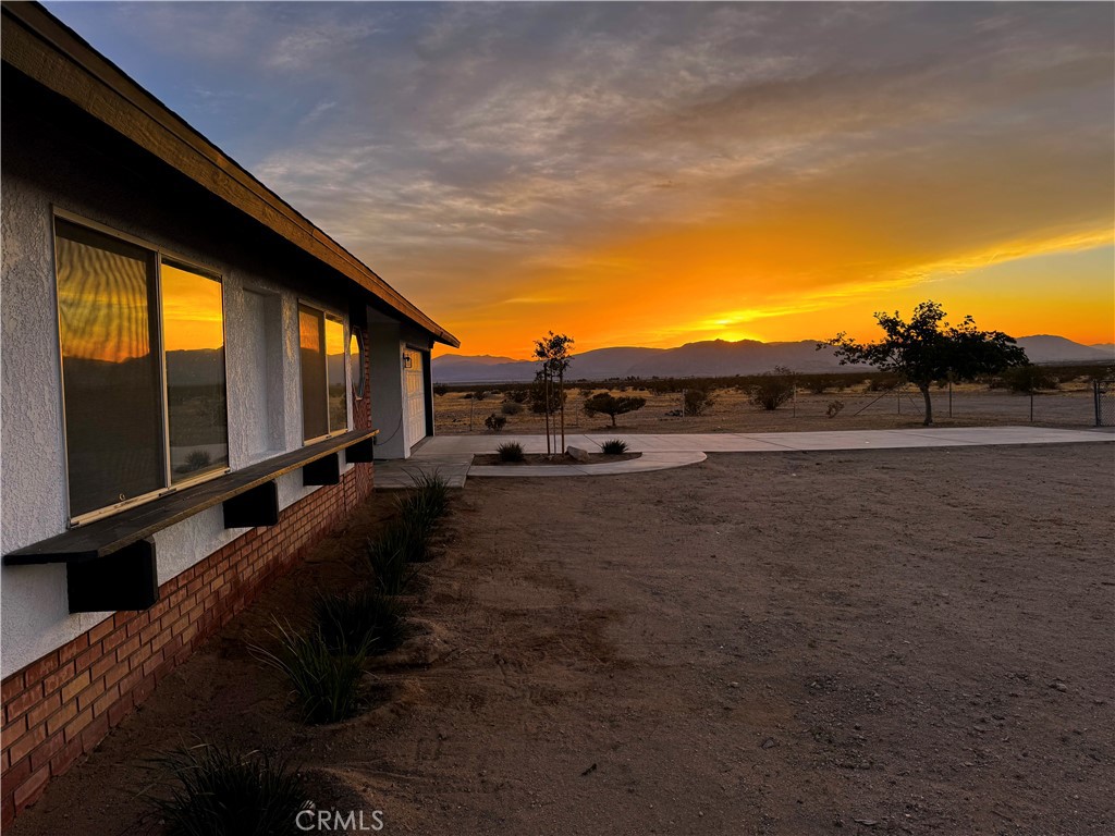 36749 Esaw Road Lucerne Valley, CA 92356 - Photo 3 of 22 a view of a street with an outdoor space