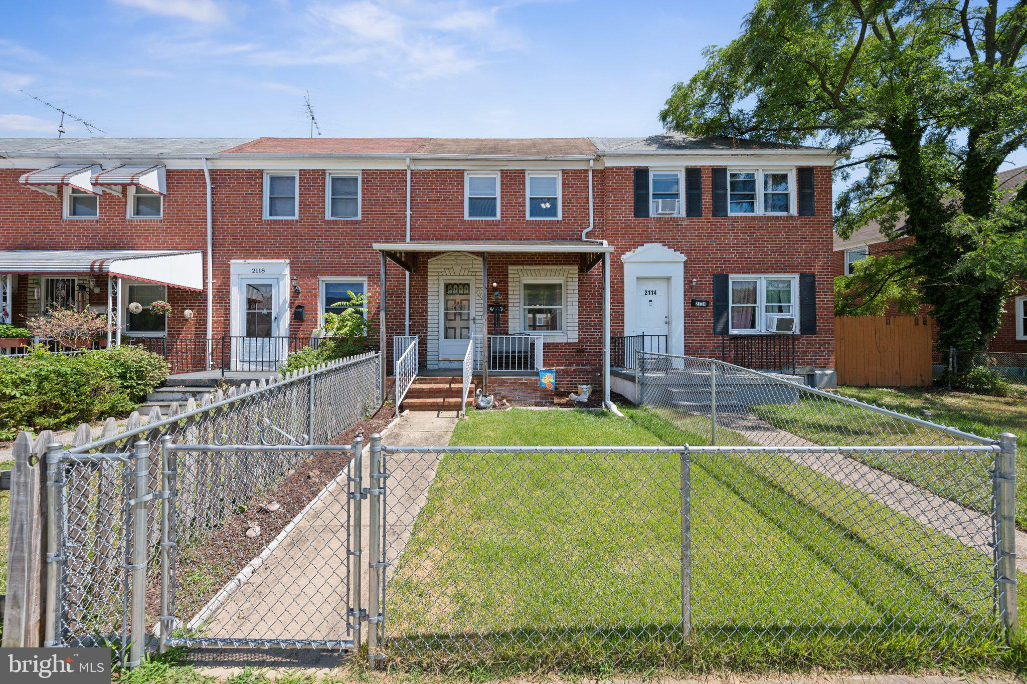 2116 Firethorn Road Middle River, MD 21220 - Photo 1 of 26 a view of house with a yard and potted plants